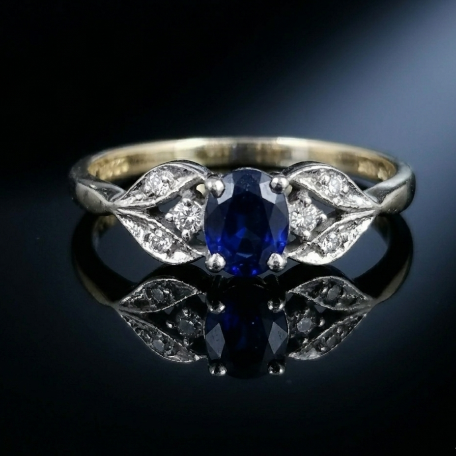 Nine carat gold Sapphire and Diamond ring
