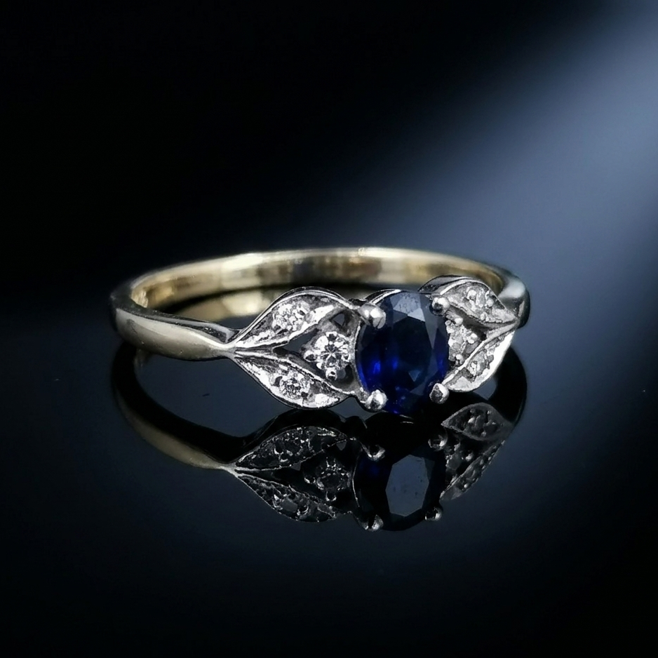 Nine carat gold Sapphire and Diamond ring