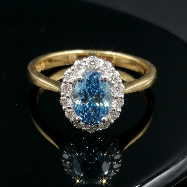 Eighteen-carat gold blue diamond ring