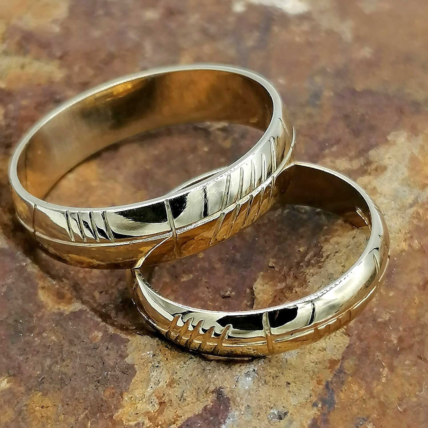 Gold wedding rings with Ogham engraving